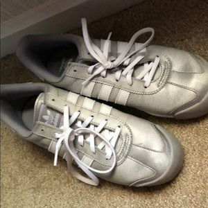 Silver and white adidas